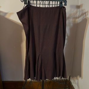 Full length skirt with kick pleat feature. Sweater material burgundy
